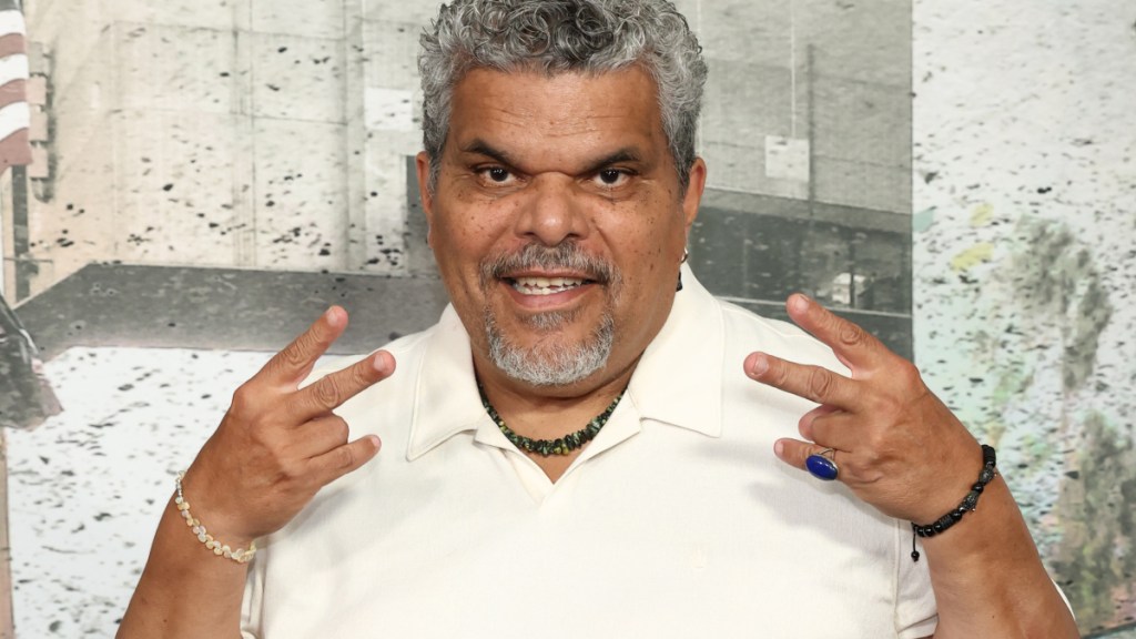 Guns Up’s Luis Guzmán Teases ‘Mind-Blowing’ Wednesday Season 2 | Interview